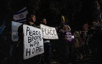 TEL AVIV, ISRAEL - JANUARY 18: Around 300 Israeli activists gather near Ministry of Defense and shout anti-war slogans as they stage a protest calling for a ceasefire in Tel Aviv, Israel on January 18, 2024. (Photo by Mostafa Alkharouf/Anadolu via Getty Images)