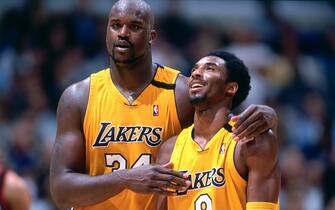 LOS ANGELES - 2000: Kobe Bryant #8 and Shaquille O'Neal #34 of the Los Angeles Lakers walk and talk during a game played circa 2000 at the Staples Center in Los Angeles, California. NOTE TO USER: User expressly acknowledges and agrees that, by downloading and or using this photograph, User is consenting to the terms and conditions of the Getty Images License Agreement. Mandatory Copyright Notice: Copyright 2000 NBAE (Photo by Andrew D. Bernstein/NBAE via Getty Images)