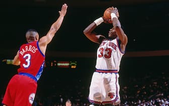 NEW YORK CITY - 1994:   Patrick Ewing #33 of the New York Knicks shoots the ball against the Philadelphia 76ers circa 1994 at Madison Square Garden in New York City. NOTE TO USER: User expressly acknowledges and agrees that, by downloading and or using this photograph, User is consenting to the terms and conditions of the Getty Images License Agreement. Mandatory Copyright Notice: Copyright 1994 NBAE (Photo by Nathaniel S. Butler/NBAE via Getty Images)