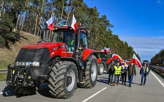 25 February 2024, Poland, Slubice: Farmers from Poland are driving their vehicles on the A2 autostrada (European route 30) towards the German-Polish border (Frankfurt/Oder). The protests by Polish farmers, which have been going on for weeks, are directed against the EU agricultural policy, but also against the import of cheap agricultural products from Ukraine. Photo: Patrick Pleul/dpa (Photo by Patrick Pleul/picture alliance via Getty Images)