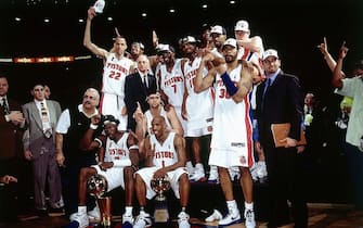 AUBURN HILLS, MI - JUNE 15:  The Detroit Pistons team poses for a picture after their win over the Los Angeles Lakers in game five of the 2004 NBA Finals at The Palace of Auburn Hills on June 15, 2004 in Auburn Hills, Michigan.  NOTE TO USER: User expressly acknowledges and agrees that, by downloading and/or using this Photograph, User is consenting to the terms and conditions of the Getty Images License Agreement. Mandatory Copyright Notice: Copyright 2004 NBAE (Photo by Andrew D. Bernstein/NBAE via Getty Images)
