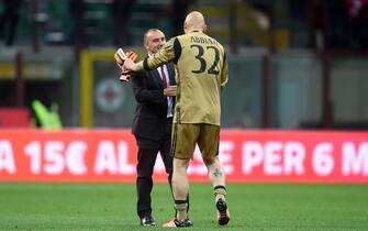 Milan's goalkeeper Christian Abbiati (R) with his headcoach Cristian Brocchi at the end of the Serie A soccer match between AC Milan and AS Roma at the Giuseppe Meazza stadium in Milan, Italy, 14 May 2016. ANSA/ DANIELE MASCOLO