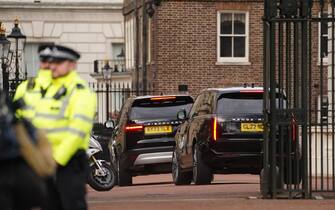 Two black SUVs, believed to be carrying Prince Harry, arrive at Clarence House, London, following the announcement of King Charles III's cancer diagnosis on Monday evening. The King has been diagnosed with a form of cancer and has begun a schedule of regular treatments, and while he has postponed public duties he "remains wholly positive about his treatment", Buckingham Palace said. Picture date: Tuesday February 6, 2024. (Photo by James Manning/PA Images via Getty Images)