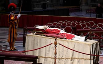 The body of the late Pope Emeritus Benedict XVI (Joseph Ratzinger) lies in state in the Saint Peter's Basilica for public viewing, Vatican City, 02 January 2023. The funeral will take place on Thursday 05 January. ANSA/ETTORE FERRARI
