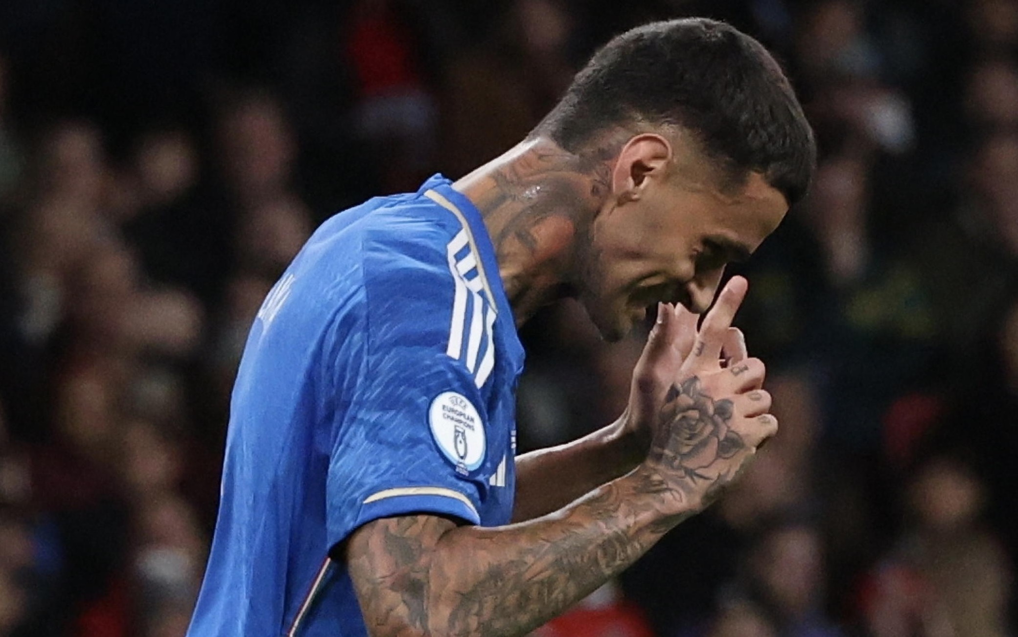 epa10924173 Gianluca Scamacca of Italy celebrates after scoring (0-1) during the UEFA EURO 2024 group C qualification round match between England and Italy in London, Britain, 17 October 2023.  EPA/NEIL HALL