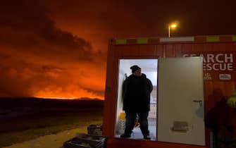 GRINDAVIK, ICELAND - DECEMBER 18: A volcano erupts on the Reykjanes Peninsula near the power station on December 18, 2023 north of Grindavik, Iceland. (Photo by Micah Garen/Getty Images)