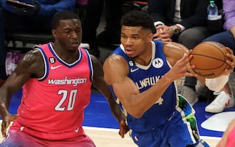 WASHINGTON, DC - APRIL 04: Milwaukee Bucks forward Giannis Antetokounmpo (34) holds the ball away from Washington Wizards guard Kendrick Nunn (20) during a NBA game between the Washington Wizards and the Milwaukee Bucks, on April 04, 2023, at Capital One Arena, in Washington, DC.
 (Photo by Tony Quinn/SipaUSA)