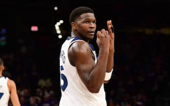 PHOENIX, AZ - APRIL  28: Anthony Edwards #5 of the Minnesota Timberwolves celebrates scoring 40 points during the game against the Phoenix Suns during the game during Round 1 Game 4 of the 2024 NBA Playoffs on April 28, 2024 at Footprint Center in Phoenix, Arizona. NOTE TO USER: User expressly acknowledges and agrees that, by downloading and or using this photograph, user is consenting to the terms and conditions of the Getty Images License Agreement. Mandatory Copyright Notice: Copyright 2024 NBAE (Photo by Kate Frese/NBAE via Getty Images)