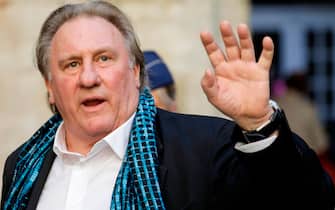 French actor Gerard Depardieu waves as he arrives at the Town Hall in Brussels for a ceremony as part of the 'Brussels International Film Festival' (Briff) on June 25, 2018. (Photo by THIERRY ROGE / BELGA / AFP) / Belgium OUT        (Photo credit should read THIERRY ROGE/AFP via Getty Images)