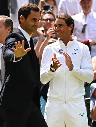 Rafael Nadal (ESP) and Roger Federer (SUI) during the centenary ceremony held on Center Court at Wimbledon to celebrate the 100 years of the court with formers Champions who won at least one time Wimbledon Championships at the AELTC in London, UK, on July 3, 2022. Photo by Corinne Dubreuil/ABACAPRESS.COM