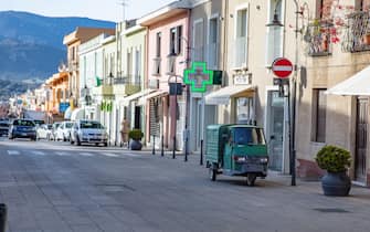 Italy, Sardinia, road, small transport vehicle at the port of Arbatax,
