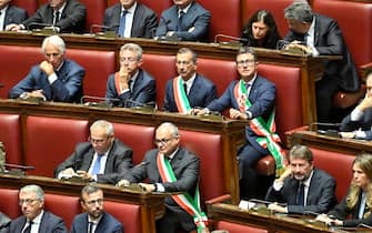 The benches of parliamentarians  during the secular State Funeral for the President Emeritus Giorgio Napolitano, in the Chamber of Montecitorio in Rome, Italy, 26 September 2023.  Italy on Tuesday mourns Giorgio Napolitano, the nation's first two-time president who died aged 98 in Rome on Friday, with a non-religious State funeral in the Lower House. 
 ANSA/ALESSANDRO DI MEO