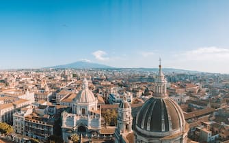 The view of the city of Catania with the view of Etna volcano, Sicily, Italy