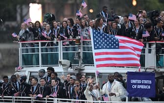 26 July 2024, France, Paris: Olympia, Paris 2024, opening ceremony of the Summer Olympics, Coco Gauff and Lebron James from the USA as flag bearers for their team. Photo: Sina Schuldt/dpa (Photo by Sina Schuldt/picture alliance via Getty Images)