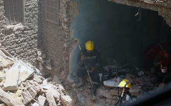 CAIRO, EGYPT - JULY 17: Civil defense forces on duty at the collapsed 4-storey building in Cairo, Egypt on July 17, 2023. At least nine people were killed. Civil defense forces rushed to the site of the collapsed building, where at least nine people were killed, to extract the victims from under the rubble. (Photo by Fareed Kotb/Anadolu Agency via Getty Images)
