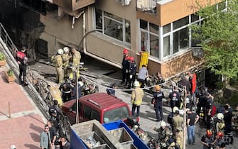 ISTANBUL, TURKIYE - APRIL 02: Fire brigades prepare to respond to a fire in a 13-storey building in Sisli district of Istanbul, Turkiye on April 02, 2024. (Photo by Hakan Akgun/Anadolu via Getty Images)