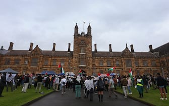 SYDNEY, AUSTRALIA - MAY 03: Protesters gather on the lawns of The University Of Sydney in support of a pro-Palestine encampment on May 03, 2024 in Sydney, Australia. Tensions escalated at The University Of Sydney as pro-Palestinian protesters vowed to maintain their presence on campus despite growing opposition, with Jewish groups planning a counter-rally and university officials urging students to respect each other's rights. (Photo by Lisa Maree Williams/Getty Images)