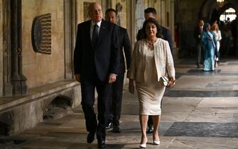 Lebanon's Prime Minister Najib Mikati (L) arrives to take his seat inside Westminster Abbey in central London on May 6, 2023, ahead of the coronations of Britain's King Charles III and Britain's Camilla, Queen Consort. - The set-piece coronation is the first in Britain in 70 years, and only the second in history to be televised. Charles will be the 40th reigning monarch to be crowned at the central London church since King William I in 1066. Outside the UK, he is also king of 14 other Commonwealth countries, including Australia, Canada and New Zealand. Camilla, his second wife, will be crowned queen alongside him, and be known as Queen Camilla after the ceremony. (Photo by Ben Stansall / POOL / AFP) (Photo by BEN STANSALL/POOL/AFP via Getty Images)