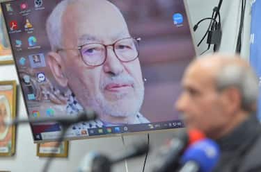 TUNIS, TUNISIA - APRIL 17: A portrait of Rached Ghannouchi displayed on screen during a press conference at Ennahda Party headquarters as Rached Ghannouchi, one of the main opponents of Tunisian President Kais Saied, has been arrested on April 17, 2023 in Tunis, Tunisia. (Photo by Hasan Mrad/DeFodi Images via Getty Images)