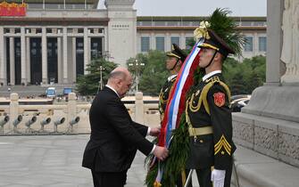 epa10649380 ussian Prime Minister Mikhail Mishustin takes part in a wreath-laying ceremony at the Monument to the People's Heroes in Tiananmen Square, in Beijing, China, 24 May 2023. The Russian and Chinese governments are coordinating the implementation of the agreements reached during the Chinese president's visit to Moscow in March, Russian Prime Minister Mikhail Mishustin said.  EPA/ALEXANDER ASTAFYEV / SPUTNIK / GOVERNMENT PRESS SERVICE / POOL MANDATORY CREDIT