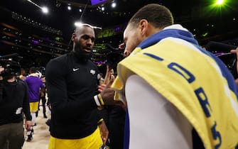 LOS ANGELES, CALIFORNIA - MAY 12: LeBron James #6 of the Los Angeles Lakers shakes hands with Stephen Curry #30 of the Golden State Warriors following game six of the Western Conference Semifinal Playoffs at Crypto.com Arena on May 12, 2023 in Los Angeles, California. NOTE TO USER: User expressly acknowledges and agrees that, by downloading and or using this photograph, User is consenting to the terms and conditions of the Getty Images License Agreement. (Photo by Harry How/Getty Images)