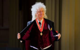 LONDON, ENGLAND - MARCH 14: Sir Brian May after being made a Knight Bachelor for services to music and charity by King Charles III during an investiture ceremony at Buckingham Palace on March 14, 2023 in London, England. (Photo by Victoria Jones - WPA Pool/Getty Images)