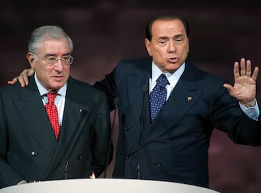 Silvio Berlusconi (D) e Marcello Dell'Utri (S) alla convention del Circolo dei giovani del buon governo a Montecatini Terme (Pistoia) l'11 novembre 2007. ANSA/MAURIZIO DEGL'INNOCENTI