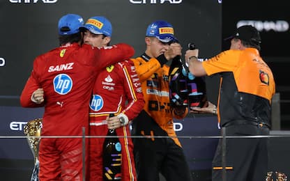 epa11765030 Second placed Scuderia Ferrari driver Carlos Sainz Jr. (L) of Spain, first placed McLaren driver Lando Norris (2-R) of Britain, McLaren Racing CEO Zak Brown (R) and third placed Scuderia Ferrari driver Charles Leclerc (2-L) of Monaco celebrate on the podium after the Formula One Abu Dhabi Grand Prix, at the Yas Marina Circuit racetrack in Abu Dhabi, United Arab Emirates, 08 December 2024.  EPA/ALI HAIDER