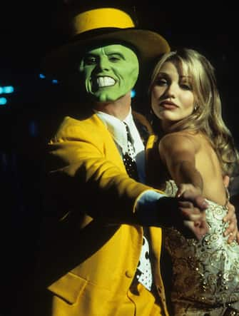 Jim Carrey dancing with Cameron Diaz in a scene from the film 'The Mask', 1994. (Photo by New Line Cinema/Getty Images)