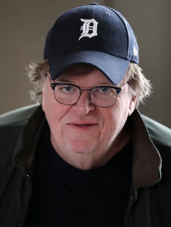 PERRY, IOWA - JANUARY 26: Filmmaker and activist Michael Moore speaks at a campaign event for Democratic presidential candidate former Vice President Joe Biden at La Poste January 26, 2020 in Perry, Iowa. A New York Times/Siena College poll conducted January 20-23 places Sanders at the top of a long list of Democrats seeking the presidential nomination with 25-percent of likely Iowa caucus-goers naming him as their first choice. Candidates former South Bend, Indiana Mayor Pete Buttigieg, former Vice President Joe Biden and Sen. Elizabeth Warren (D-MA) are polling at 18, 17 and 15-percent, respectively. (Photo by Chip Somodevilla/Getty Images)