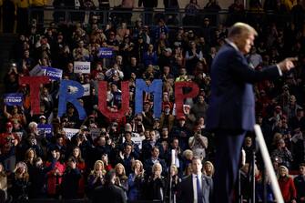 MANCHESTER, NEW HAMPSHIRE - JANUARY 20: Republican presidential candidate and former President Donald Trump takes the stage during a campaign rally at the SNHU Arena on January 20, 2024 in Manchester, New Hampshire. Trump is rallying four days before New Hampshire voters will weigh in on the Republican nominating race with their first-in-the-nation primary. (Photo by Chip Somodevilla/Getty Images)