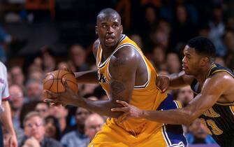 LOS ANGELES, CA - 1999: Shaquille O'Neal #34 of the Los Angeles Lakers handles the ball against the Indiana Pacers  during a game in 1999 at Staples Center in Los Angeles, California. NOTE TO USER: User expressly acknowledges and agrees that, by downloading and/or using this Photograph, user is consenting to the terms and conditions of the Getty Images License Agreement. Mandatory Copyright Notice: Copyright 1999 NBAE (Photo by Andrew D. Bernstein/NBAE via Getty Images)