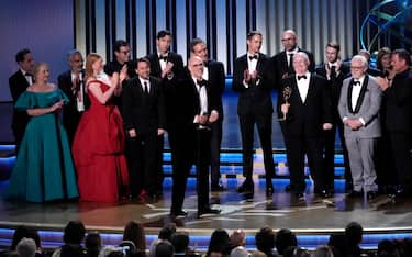 Jan 15, 2024; Los Angeles, CA, USA; Jesse Armstrong accepts the award for best drama series for ‘Succession’ with the case and crew during the 75th Emmy Awards at the Peacock Theater in Los Angeles on Monday, Jan. 15, 2024. Mandatory Credit: Robert Hanashiro-USA TODAY/Sipa USA