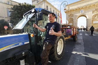 epa11105678 French farmers in tractors arrive to Montpellier to demonstrate in front of prefecture of Montpellier, France, 26 January 2024. French farmers continue their protests with road blockades and demonstrations in front of state buildings awaiting a response from the government to their request for  immediate  aid of several hundred million euros. On 23 January, the EU Agriculture and Fisheries Council highlighted the importance of providing the conditions necessary to enable EU farmers to ensure food security sustainably and profitably, as well as ensuring a fair income for farmers.  EPA/GUILLAUME HORCAJUELO