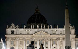 This photograph shows the St. Peter's Square with the cupola's lights switched off as part of the international campaign Earth Hour launched by the NGO World Wide Fund for Nature (WWF), at the Vatican, Vatican City, on March 22, 2025. (Photo by Filippo MONTEFORTE / AFP)