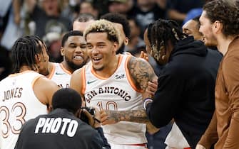 SAN ANTONIO, TX - MARCH 25:  Jeremy Sochan #10 of the San Antonio Spurs is surrounded by teammates after his three-pointer in closing second gave the Spurs the 104-102 victory over the Phoenix Suns at Frost Bank Center on March 25, 2024 in San Antonio, Texas. NOTE TO USER: User expressly acknowledges and agrees that, by downloading and or using this photograph, User is consenting to terms and conditions of the Getty Images License Agreement. (Photo by Ronald Cortes/Getty Images)