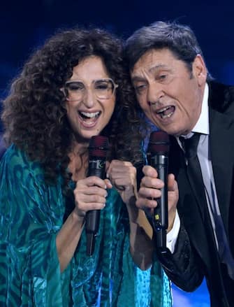 Sanremo Festival co-host and Italian actress Teresa Mannino with Italian singer Gianni Morandi perform on stage at the Ariston theatre during the 74th Sanremo Italian Song Festival, in Sanremo, Italy, 08 February 2024. The music festival will run from 06 to 10 February 2024.  ANSA/ETTORE FERRARI