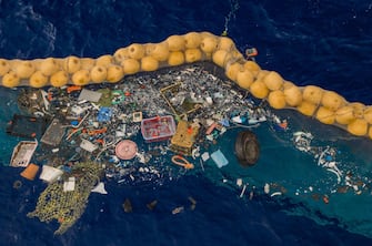 epa07892087 A handout photo made available by The Ocean Cleanup shows the company's ocean cleanup prototype System 001/B capturing plastic debris in the Great Pacific Garbage Patch, in the Pacific Ocean, 30 September 2019 (issued 03 October 2019). The self-contained system uses natural currents of the sea to passively collect plastic debris in an effort to reduce waste in the ocean. According to the Ocean Cleanup, the system is also able to filter microplastics as small as 1mm.  EPA/THE OCEAN CLEANUP HANDOUT  HANDOUT EDITORIAL USE ONLY/NO SALES