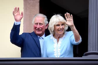 epa10610038 (FILE) - Britain's Prince Charles, the Prince of Wales, and Camilla, the Dutchess of Cornwall, wave to people from the 'Rathaus' in Leipzig, Germany, 08 May 2019 (reissued 05 May 2023). Britain's King Charles III's Coronation will take place at Westminster Abbey in London on 06 May 2023. The King will be crowned alongside Camilla, the Queen Consort.  EPA/CLEMENS BILAN *** Local Caption *** 55176754