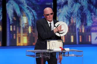 CANNES, FRANCE - MAY 25: Jacques Audiard receives the 'Jury Prize' Award for 'Emilia Perez' during the Closing Ceremony at the 77th annual Cannes Film Festival at Palais des Festivals on May 25, 2024 in Cannes, France. (Photo by Victor Boyko/Getty Images)