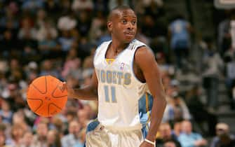 DENVER - NOVEMBER 3:  Earl Boykins #11 of the Denver Nuggets controls the ball during the game against the Minnesota Timberwolves at Pepsi Center on November 3, 2006 in Denver, Colorado.  The Timberwolves won 112-109.   NOTE TO USER: User expressly acknowledges and agrees that, by downloading and/or using this Photograph, user is consenting to the terms and conditions of the Getty Images License Agreement.  (Photo by Doug Pensinger/Getty Images)