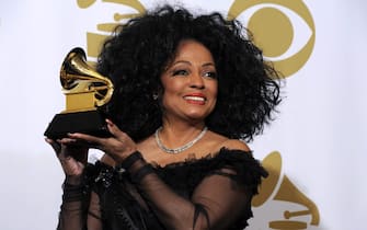epa03103794 US singer Diana Ross holds up her Grammy Award in the Press Room at the 54th Annual Grammy Awards at the Staples Center in Los Angeles, California, USA, 12 February 2012. Ross received a Grammy for Life-Time Achievement.  EPA/PAUL BUCK