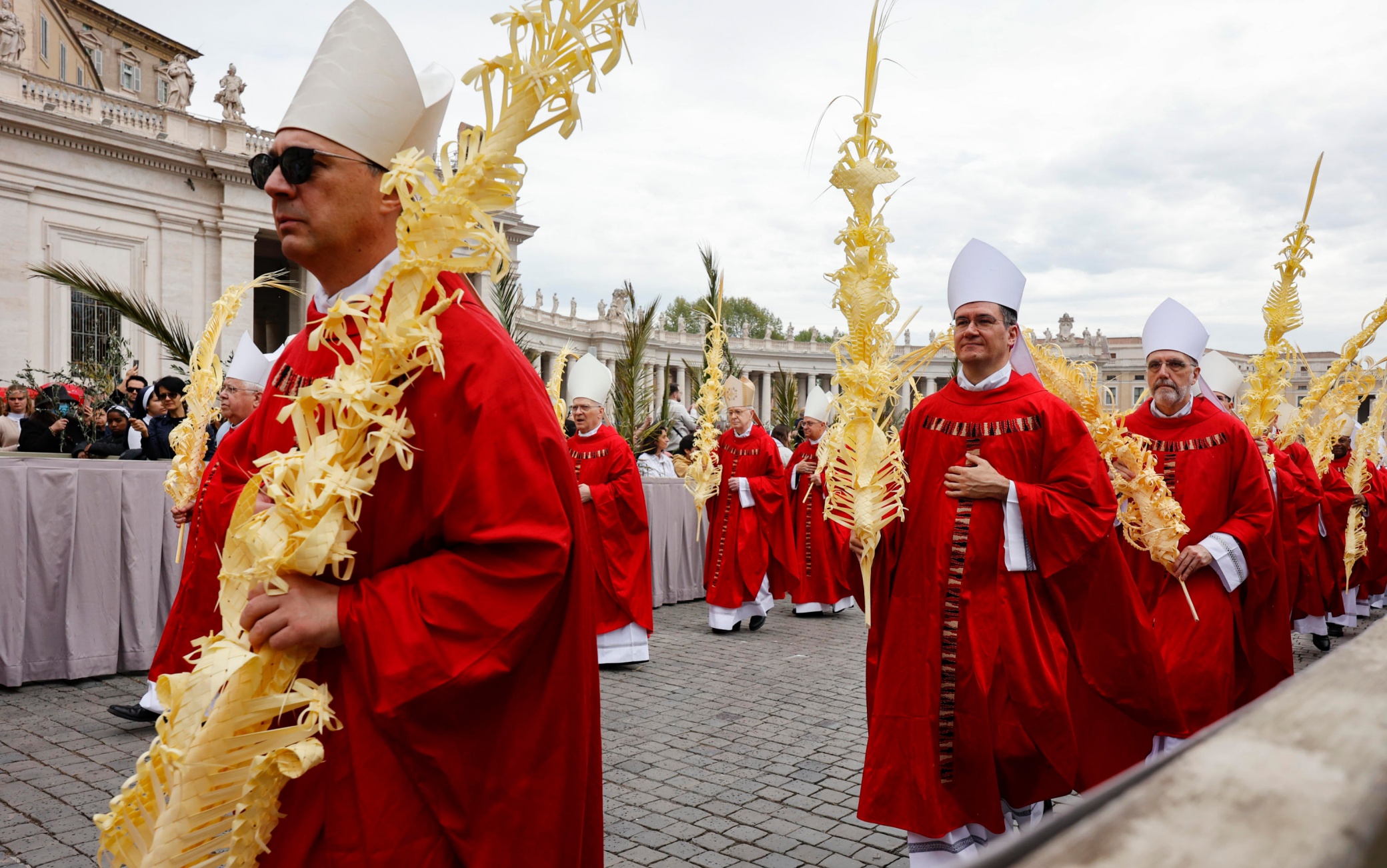 Cardinals and bishops during the mass on Palm Sunday in St. Peter's Square at The Vatican, 13 April 2025. ANSA/FABIO FRUSTACI 
