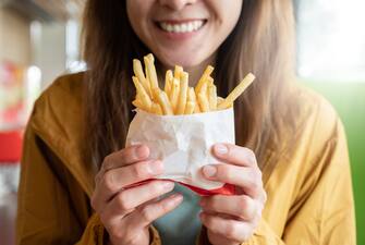 French fries are thin strips of deep-fried potato topped with a choice of condiments.