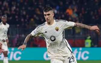 AS Roma's defender Gianluca Mancini in action against AC Monza's mildfielder Matteo Pessina during the Italian Serie A soccer match between AC Monza and AS Roma at U-Power Stadium in Monza, Italy, 2 March 2024. ANSA / ROBERTO BREGANI