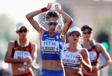 BUDAPEST, HUNGARY - AUGUST 20: Antonella Palmisano of Team Italy cools down with an ice pack in the 20km Race Walk Women during day two of the World Athletics Championships Budapest 2023 at National Athletics Centre on August 20, 2023 in Budapest, Hungary. (Photo by Steph Chambers/Getty Images)