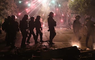 epaselect epa10718277 Riot police clash with protesters in Nanterre, near Paris, France, 29 June 2023. Violence broke out after police fatally shot a 17-year-old during a traffic stop in Nanterre on 27 June 2023. According to the French interior minister, 31 people were arrested with 2,000 officers being deployed to prevent further violence.  EPA/JULIEN MATTIA