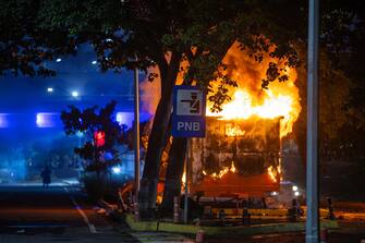 epa11507710 View of a structure of the Bolivarian National Police (PNB) set on fire during protests against the results of the presidential elections on the Prados del Este highway, in Caracas, Venezuela, 29 July 2024. Protests are taking place in Caracas after the National Electoral Council (CNE) proclaimed that Nicolas Maduro was re-elected president of Venezuela, following elections held on 28 July. Thousands of citizens have come out to protest against the results announced by the National Electoral Council (CNE), which gave President Maduro 51.2% of the votes, a figure questioned by the opposition and by a good part of the international community. Opposition leader Maria Corina Machado claims they have obtained enough of the vote tallies to prove they won the presidential elections that took place on 28 July.  EPA/Henry Chirinos