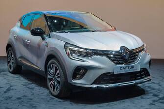 Barcelona, Spain - October 7, 2021: Renault Captur E-Tech Hybrid Initiale Paris showcased at Automobile Barcelona 2021 in Barcelona, Spain.