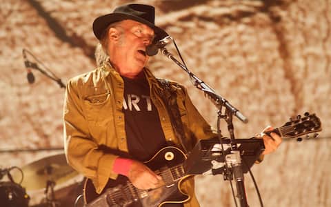 Neil Young at Farm Aid at the First Merit Bank Pavillion at Northerly Island on September 19th, 2015 in Chicago, Illinois. (Photo by Paul Natkin/Getty Images)